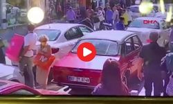 Sokak ortasında eşini taciz eden sapığı, tekme tokat dövdü