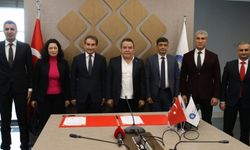 Başkan Böcek’den çalışanları sevindiren imza